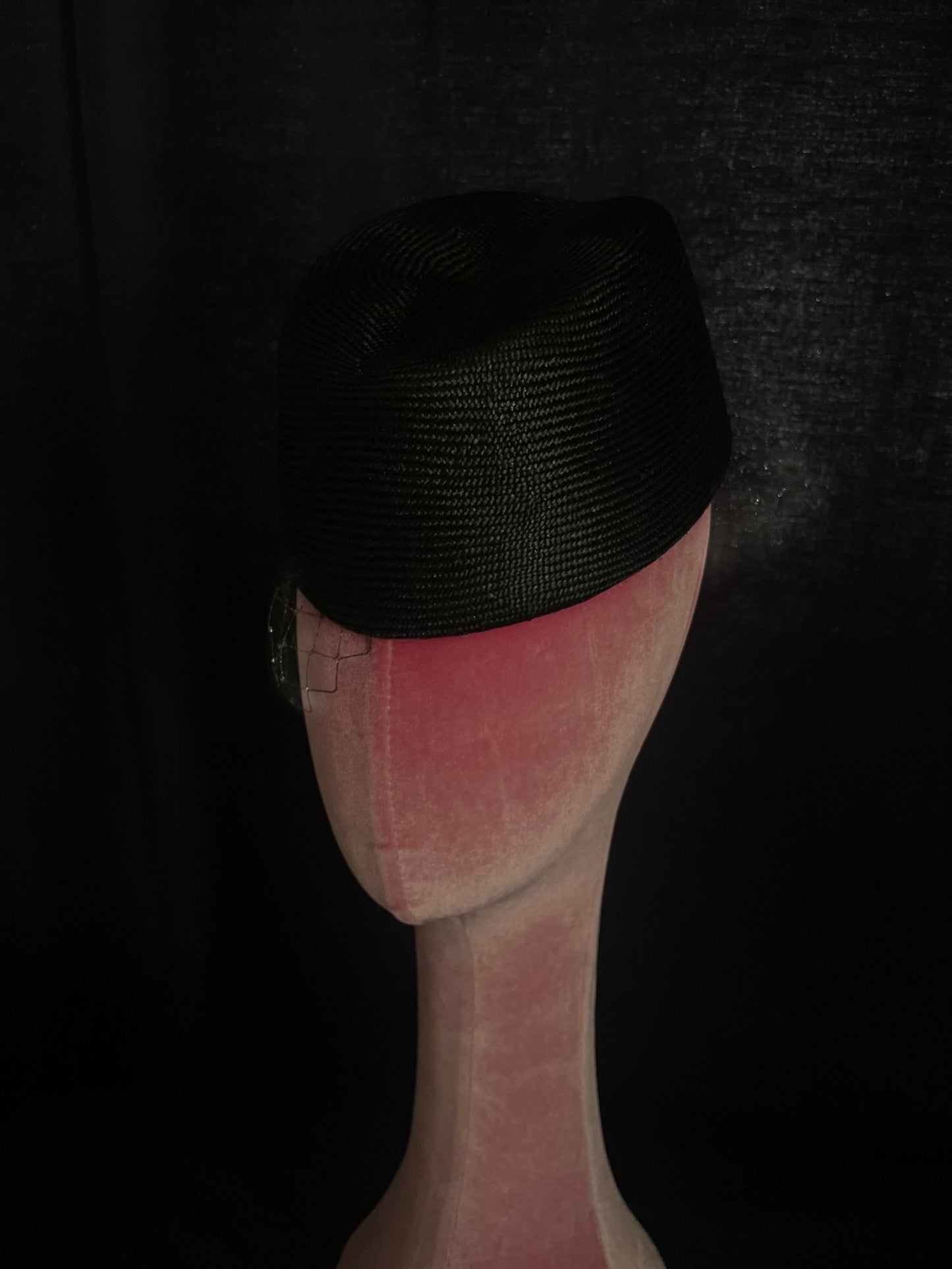 Asymmetric net trimming cocktail hat