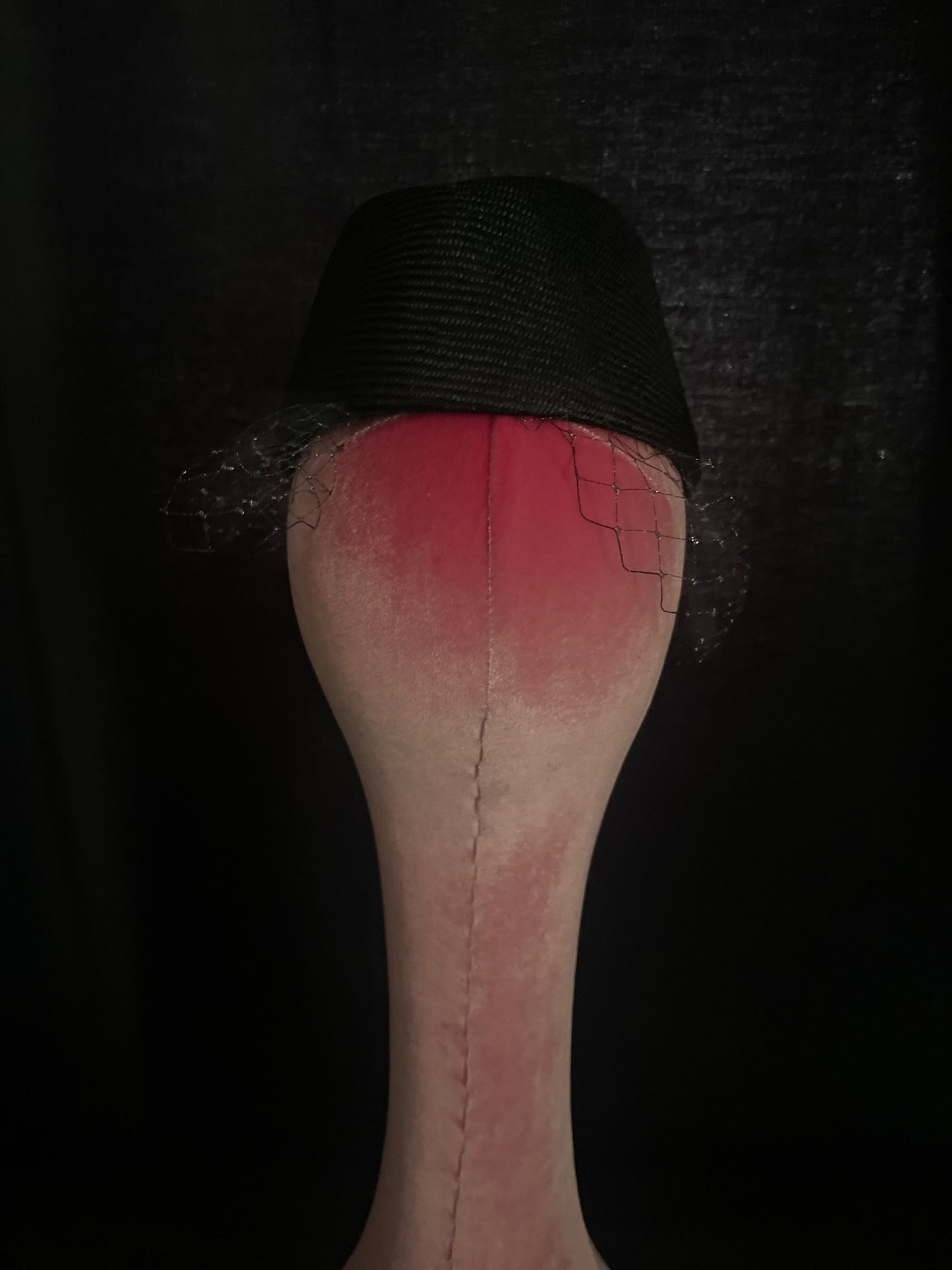 Asymmetric net trimming cocktail hat